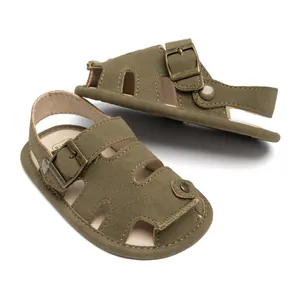 Close-up of olive green PU leather baby sandals with vintage buckles and non-slip soft sole