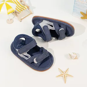 Infant camouflage navy blue sandals with non-slip rubber soles and velcro straps
