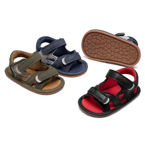 Detail of camouflage baby sandals with non-slip soles and adjustable velcro straps