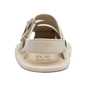 Detail view of baby sandals showing heel structure and 0-6 months size marking