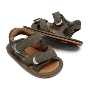 Detail view of baby sandals with camouflage pattern and dual velcro straps closure