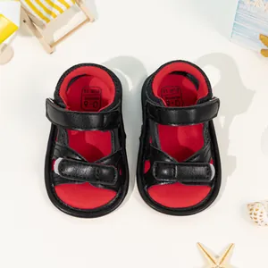 Infant summer sandals in black and red with camouflage pattern and dual velcro straps