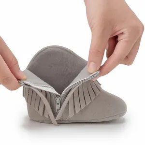 Grey suede baby tassel boots with flexible soft soles and convenient rear zipper design
