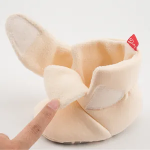 Detail of baby winter boot featuring warm fleece lining and adjustable velcro closure