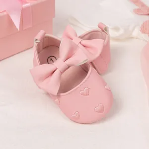 Pink baby Mary Jane shoes with large bow and heart embroidery for 0-1 year infants