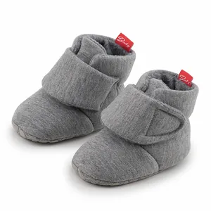 Fleece lined winter baby shoes with non-slip soft sole and Velcro closure in grey color