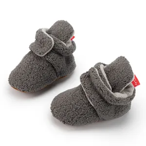 Detail of baby soft-sole walking shoes with velcro strap and warm fleece lining