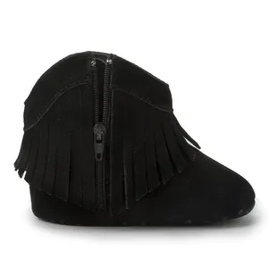 Close-up of black baby tassel boots featuring side zipper and non-slip soft soles
