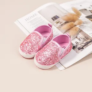 Pink sequined baby girl walking shoes with non-slip soft sole and easy slip-on design
