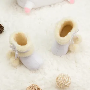 Bottes de neige bébé hiver blanches avec doublure polaire et nœuds à pompons