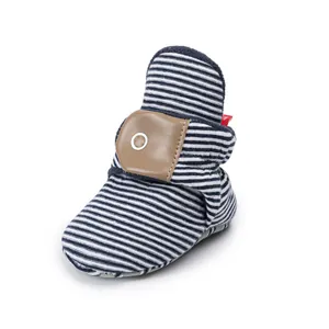 Blue and white striped baby sock boots with warm fleece lining and adjustable strap