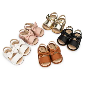 Summer baby sandals with bow decoration in pink, gold, black, white, and brown colors
