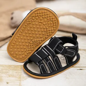 Infant summer walking sandals in black with anti-slip rubber star-patterned sole