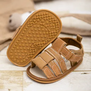 Brown infant summer sandals with non-slip star-patterned rubber soles for babies