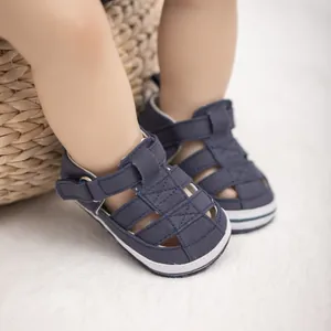 Sandales pour bébé en toile bleu marine avec semelle souple antidérapante et velcro