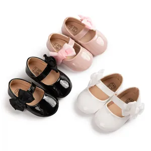 Scarpe Mary Jane per neonato in rosa, nero e bianco con grandi fiocchi e suola morbida