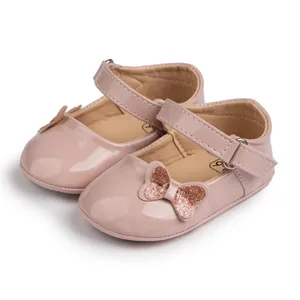 Pink PU leather baby Mary Jane shoes with glitter bow and velcro strap for infants