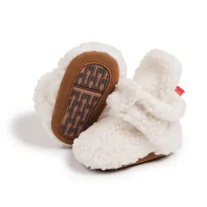 Soft coral fleece baby boots with anti-slip soles and adjustable velcro straps