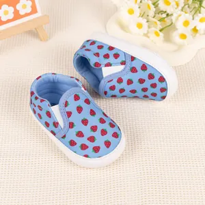 Blue baby walking shoes with red strawberry prints and soft non-slip soles