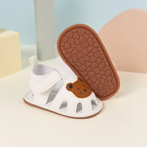Detailed macro view of non-slip rubber sole with size marking for baby walking sandals
