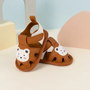 Detail view of baby walking sandals with bear pattern and breathable cutout toe design