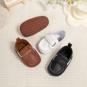 Non-slip baby loafers for 0-1 year olds in brown white and black with velcro straps