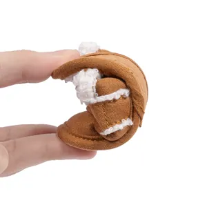 Close-up of flexible brown baby walker shoe with soft white fleece lining and plush interior