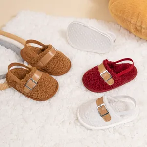 Fuzzy baby walking shoes in brown, red, and white with non-slip soles and elastic straps