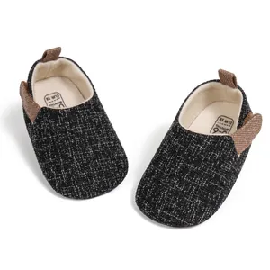 Detailed view of breathable baby walking shoes with size 0-6 months on the inner sole