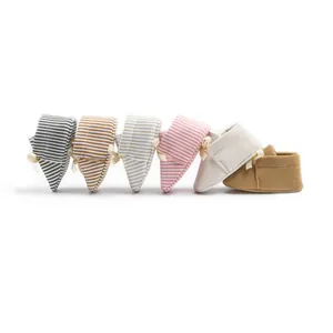 Collection of striped soft sole baby shoes with cute bow details in multiple colors