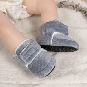 Detail view of baby winter boots with warm lamb wool lining and Velcro strap closure