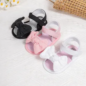 Toddler bow sandals in black, pink and white with breathable fabric and velcro straps