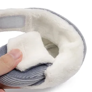 Detail view of winter baby boots with warm plush lining and corduroy fabric