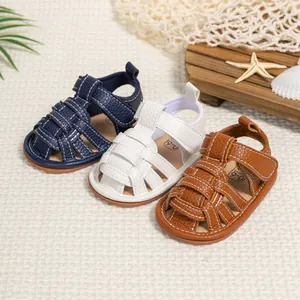 Toddler woven sandals in navy, white, and tan colors with size markings for 0-6 months