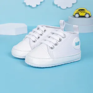Chaussures classiques en toile blanche pour bébé avec semelle souple et lacets
