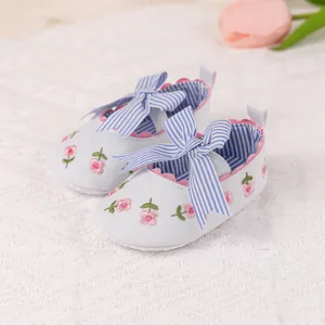 Blue soft sole baby princess shoes with floral embroidery and striped bow detail