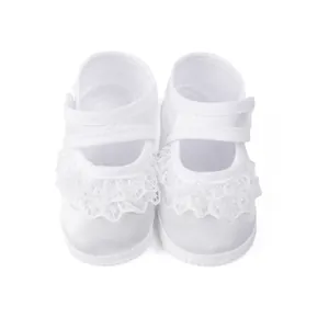 Elegant white satin baby shoes with delicate lace trim and velcro strap for baptism