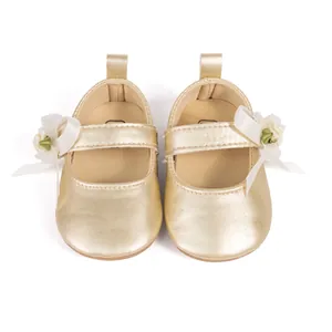 Golden Mary Jane baby shoes with white ribbon bow and 3D flower for toddlers