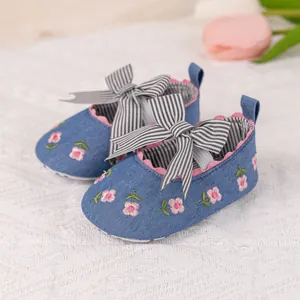 Blue denim baby princess shoes with floral embroidery and striped bow for toddlers
