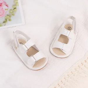 White soft PU leather baby sandals with adjustable straps and breathable honeycomb sole