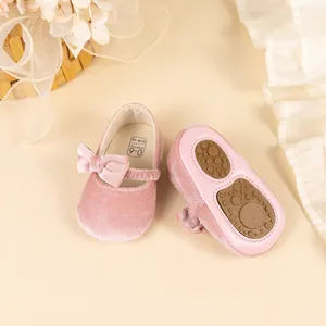 Pink velvet baby princess shoes with bow and anti-slip rubber soles for toddlers