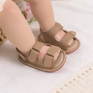 Detail of khaki PU leather baby sandals with double velcro straps and soft fabric lining