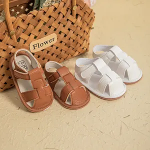 Detail of baby summer sandals featuring soft leather texture and breathable T-strap design