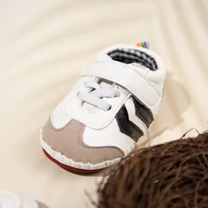 Infant soft-sole walking shoes with white lychee grain leather and brown suede toe caps