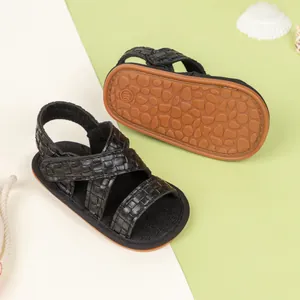 Infant boy summer sandals with black woven straps and anti-slip rubber soles