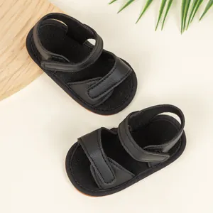 Infant boys black leather sandals with adjustable double velcro and non-slip soft brown soles