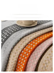 Macro detail of thick waffle texture chenille fabric in various colors for sofa covers