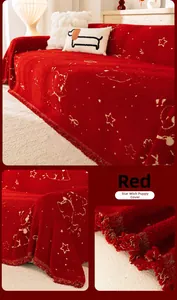 Detail of red cartoon puppy sofa cover with plush fabric texture and fringed edges