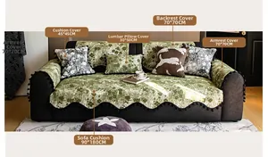 Detail showing Chenille sofa cover components with floral pattern and black pompom trim
