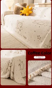 Detail of coffee brown dog pattern sofa cover with thick plush fabric and tassels